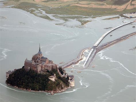 Normandy 'island' Mont Saint-Michel cut off by extreme high tide | The ...