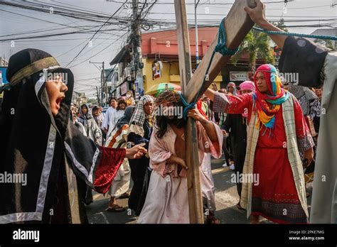 Antipolo, Philippines. 07th Apr, 2023. A Catholic faithful suffers from ...