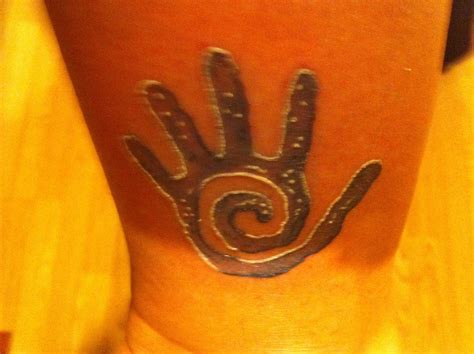 Healing Hand Symbol Tattoo