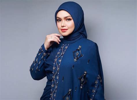 Siti Nurhaliza's 19-yr record broken by Coldplay, hopes to regain it before retiring | The Star