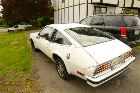 OLD PARKED CARS.: 1980 Pontiac Sunbird.