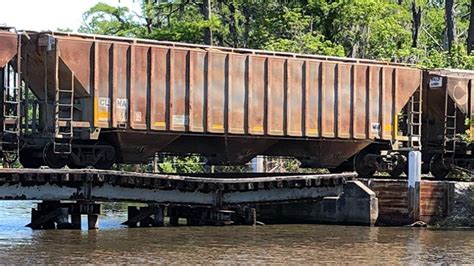 Railroad trestle collapses, leaving train stopped for hours - Railway ...