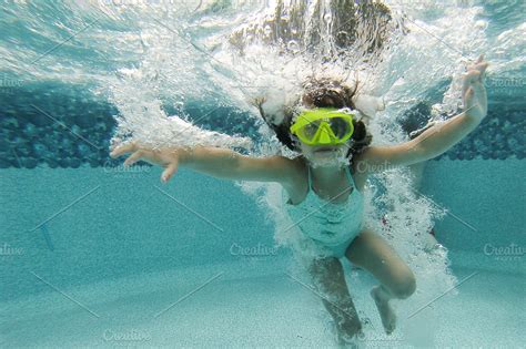 Girl Swimming Underwater | High-Quality Sports Stock Photos ~ Creative ...