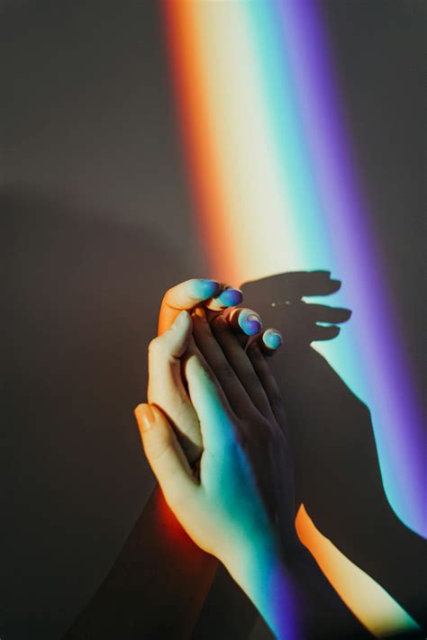 Persons Hands With Rainbow Colors · Free Stock Photo