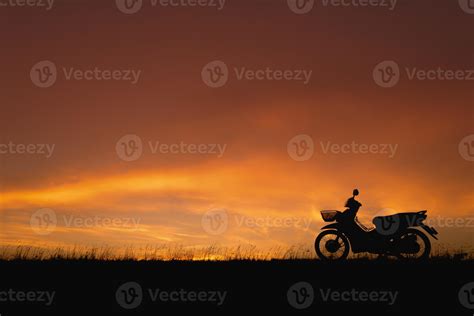 Orange sunset sky. Silhouette motorcycle in sunset landscape backdrop 9971088 Stock Photo at ...