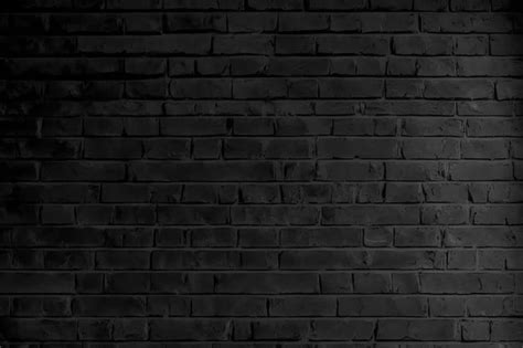 Premium Photo | Black brick wall background with a white text that says ...