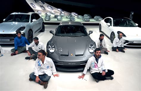 Why Environmental Activists Glued Papers on Porsches and Themselves to the Autostadt Floor ...