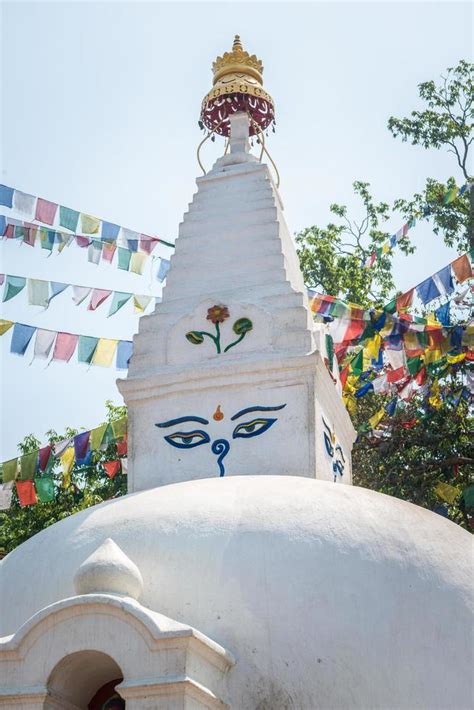 The stupa in Nepalese style located in Kathmandu, Nepal. Stupa is a ...