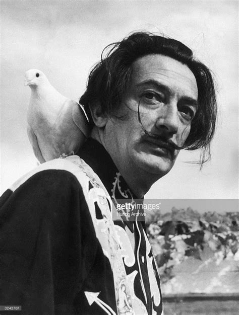 Spanish Surrealist artist Salvador Dali poses outdoors with a white... | Salvador dalí, Dalí, El ...