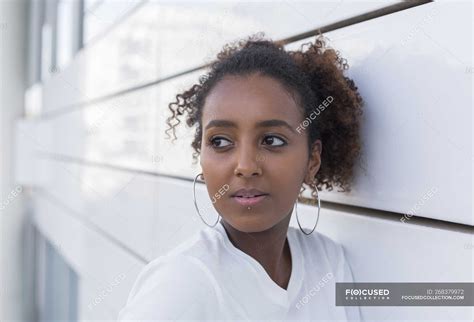 Portrait of african american woman with lip piercing looking away — attractive, thinking - Stock ...