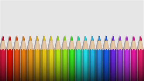 Premium Vector | Rainbow colored pencils lie in a row on a white background