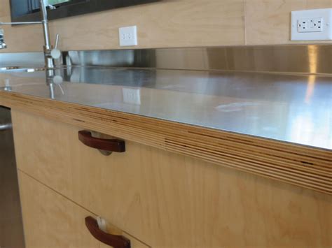 Modern Kitchen Design with Stainless Steel Countertop