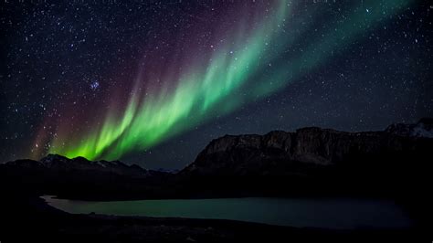 Download wallpaper 2560x1440 northern lights, starry sky, mountains, lake, night widescreen 16:9 ...