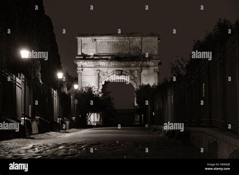 Arco di Tito (Arch of Titus) at night in Rome, Italy Stock Photo - Alamy