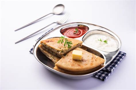 Aloo Gobi Paratha 16585246 Stock Photo at Vecteezy