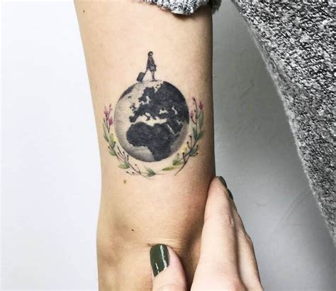 Globe tattoo by Eva Krbdk | Post 17441 | Globe tattoos, Cover up tattoos for women, Balloon tattoo