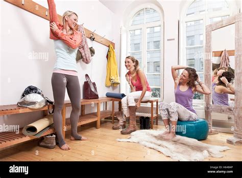 Group Of Women Changing Clothes In Yoga Studio Changing Room Stock | SexiezPix Web Porn