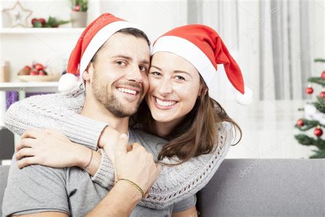 Young happy couple hug and love christmas Stock Photo by ...