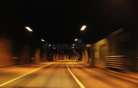 Highway tunnel at night stock image. Image of headlights - 17471351