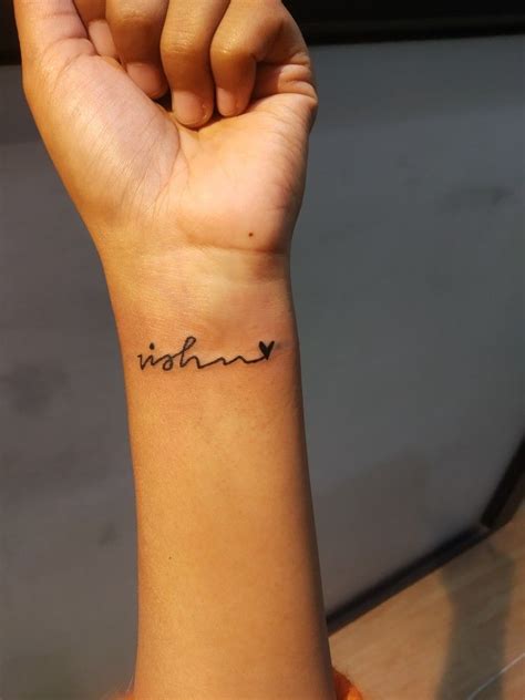 Small name tattoo on wrist | Name tattoos on wrist, Name tattoo on hand ...