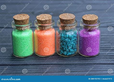 A Row of a Set of Small Glass Decorative Bottles with Colored Sand Stock Image - Image of sand ...