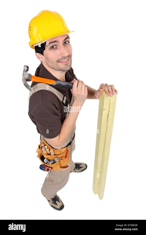 A carpenter with a hammer Stock Photo - Alamy