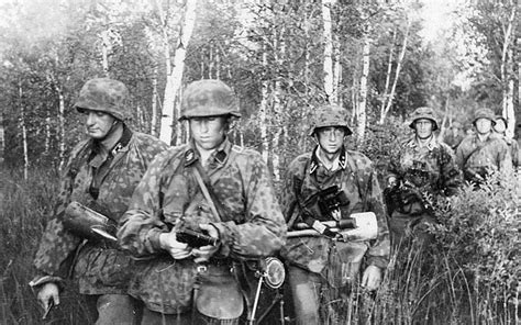 Soldiers of the 1st SS Panzer Division LSSAH during the attacks on the Stalin Line. [July 1941 ...