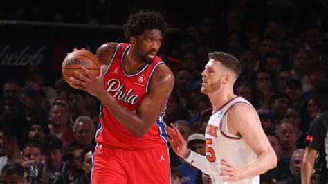 Joel Embiid injury update: 76ers center heads to locker room with knee ...