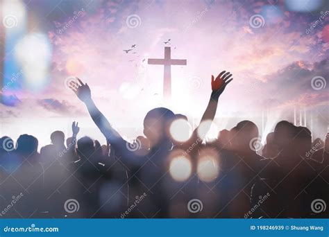 Christian People Group Raise Hands Up Worship God Jesus Christ Together On Cross Over Cloudy Sky ...