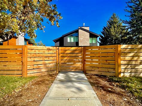 Horizontal Privacy Fence With Solar Powered Gate | eTimbers