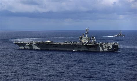 USS Mason (DDG 87), top, pulls away from USS Abraham Linco… | Flickr
