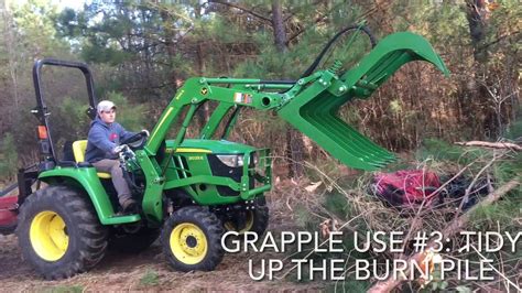 John Deere 3025E with our new 48” Titan Attachments Grapple - YouTube