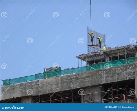 Construction Workers Install Reinforcement Bars at the Construction ...