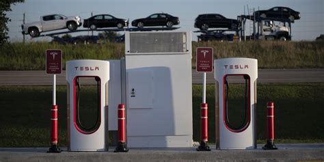 Tesla Looks to Open Its EV-Charging Network - WSJ