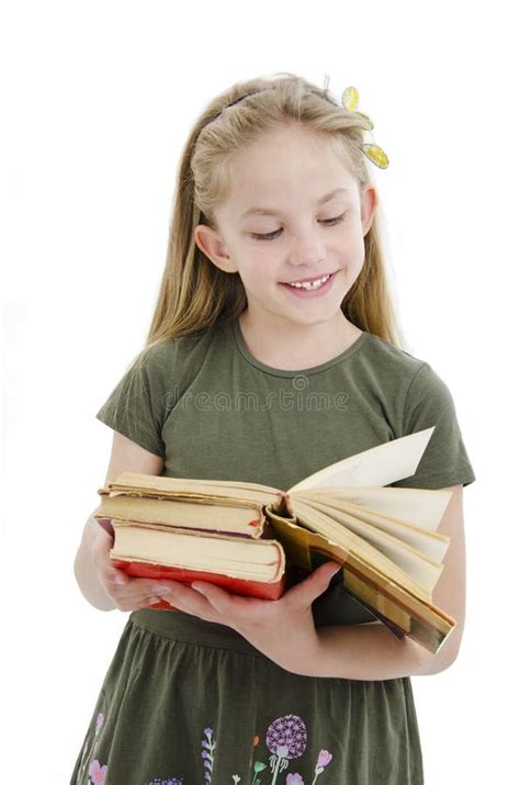 Beautiful Little Girl Reading Book. Adorable Modern Little Girl Standing With Books Stock Image ...