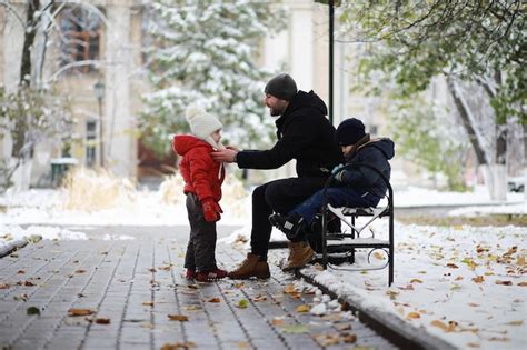 Premium Photo | Children in winter park play