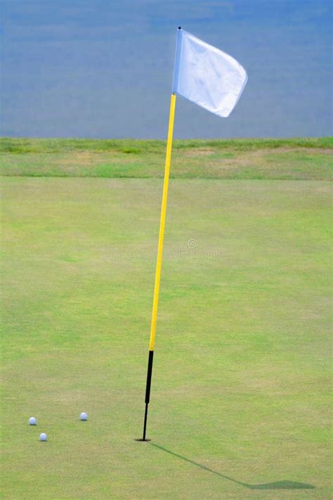 Golf hole with a flag stock photo. Image of fairway, white - 14192840