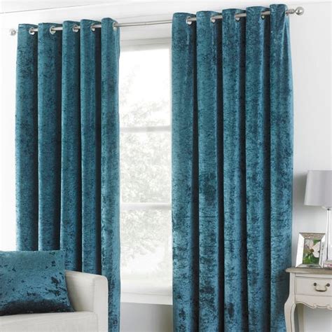 Verona Teal Velvet Eyelet Curtains | Dunelm