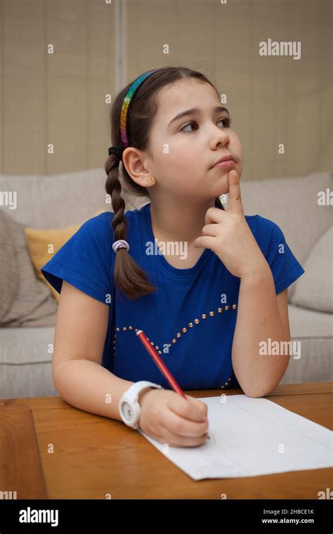 Kids doing homework table hi-res stock photography and images - Alamy