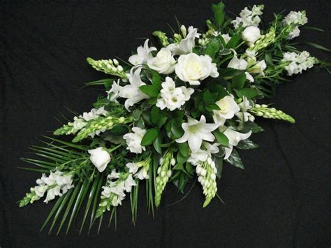 Funeral Casket Sprays - Lilies freesia roses in 2020 | Casket sprays, Funeral caskets