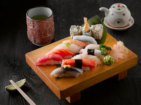 Sushi On Brown Wooden Board · Free Stock Photo