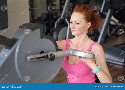 Girl Doing Hands Spinning Machine Workout Stock Image - Image of hair ...