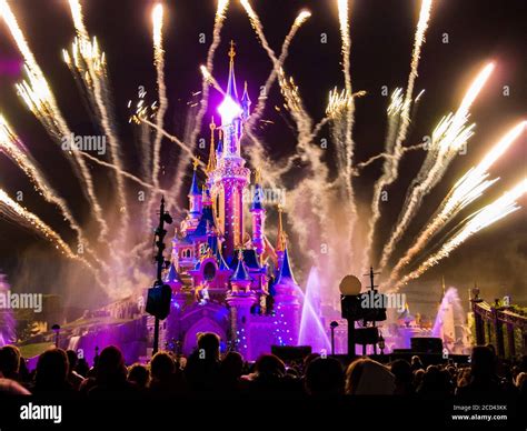 Disneyland Paris, castle with fireworks Stock Photo - Alamy