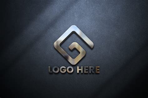 Logo Mockup on Gray Wall – GraphicsFamily