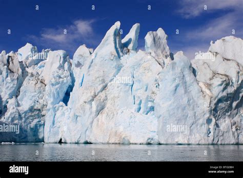 Icebergs and Glaciers are ever present in East Greenland Stock Photo ...