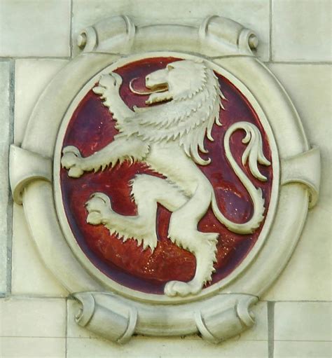 Lion Emblem Logo On Building Free Stock Photo - Public Domain Pictures