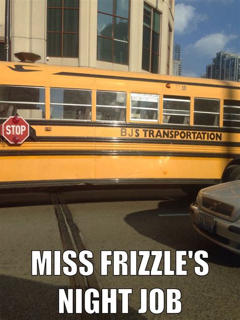 a yellow school bus driving down a street next to tall buildings with the words miss frizzle's ...