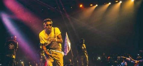 Shatta Wale describes Ghana a village at his show in London