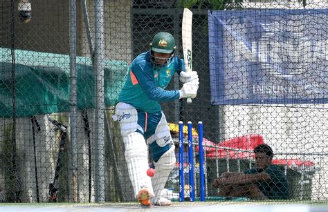 Usman Khawaja prepares to meet the ball off the front foot ...