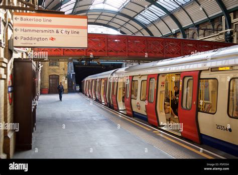 District Line train at Paddington Underground station in London Stock ...